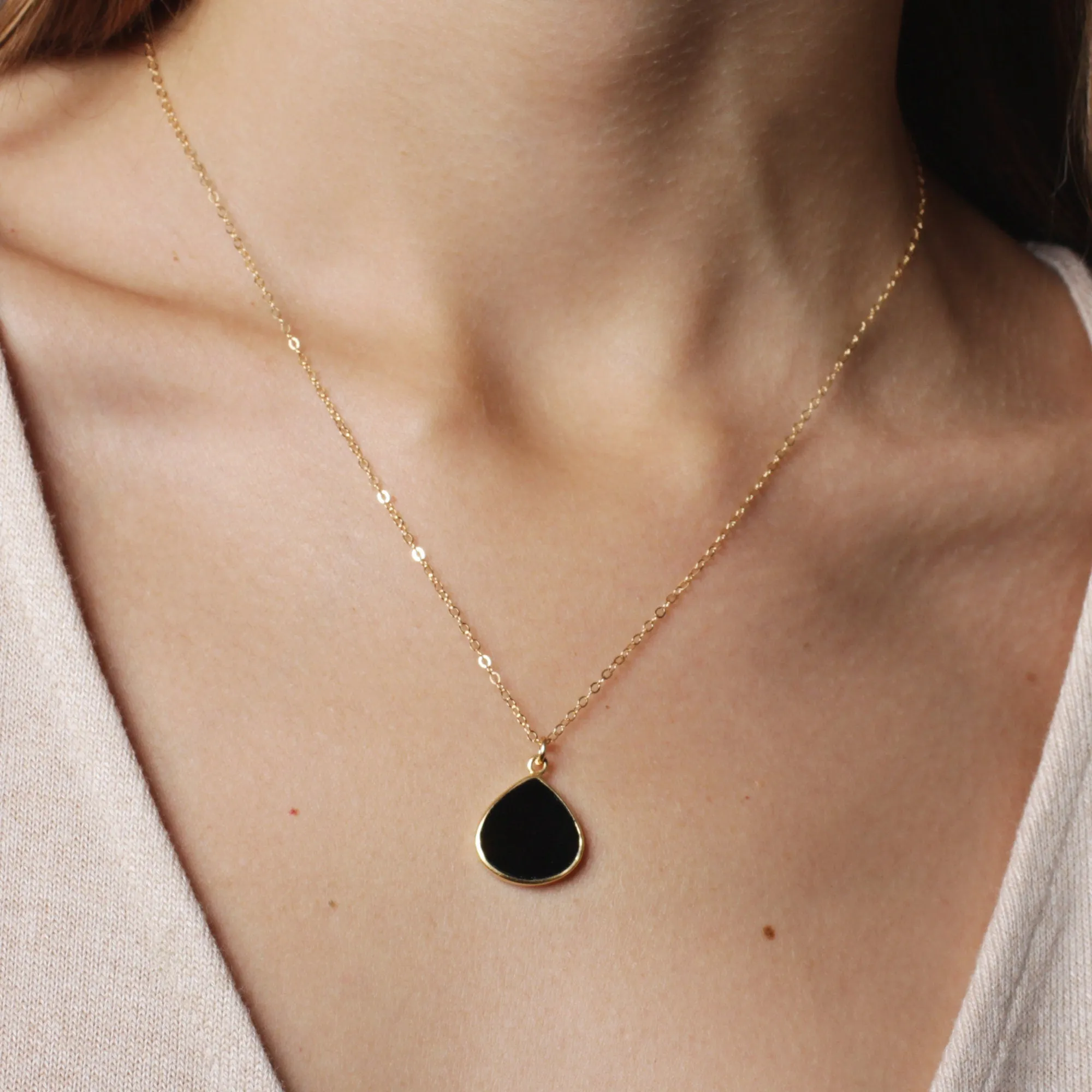 Black onyx gold drop necklace