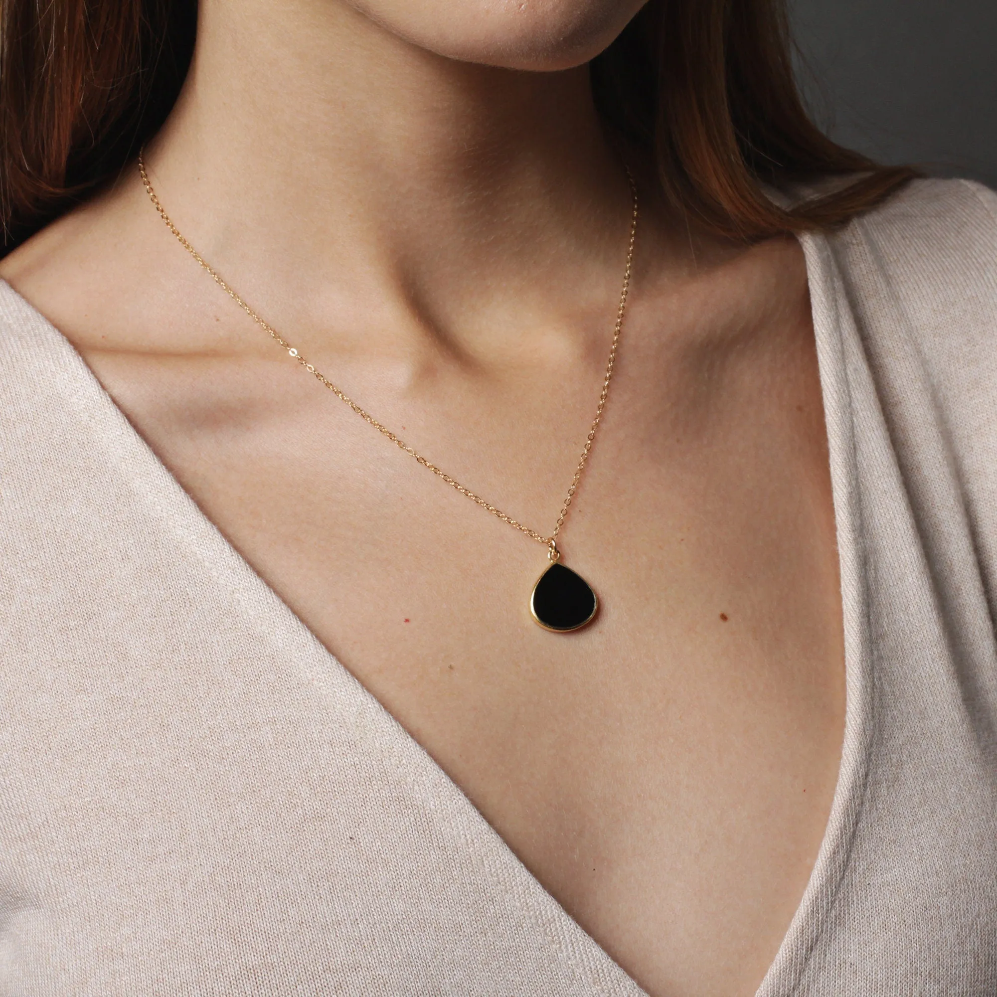 Black onyx gold drop necklace